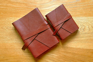 The A6 small leather journal (right) with its A5 medium version (left)