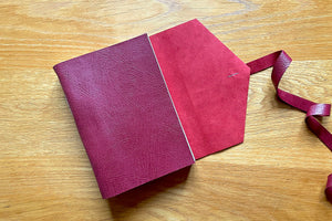 Softcover leather sketchbook with natural suede inner cover bound by hand