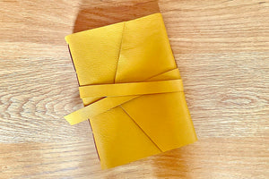 Leather Artist's Sketchbook bound by hand in Mustard Yellow and Rust