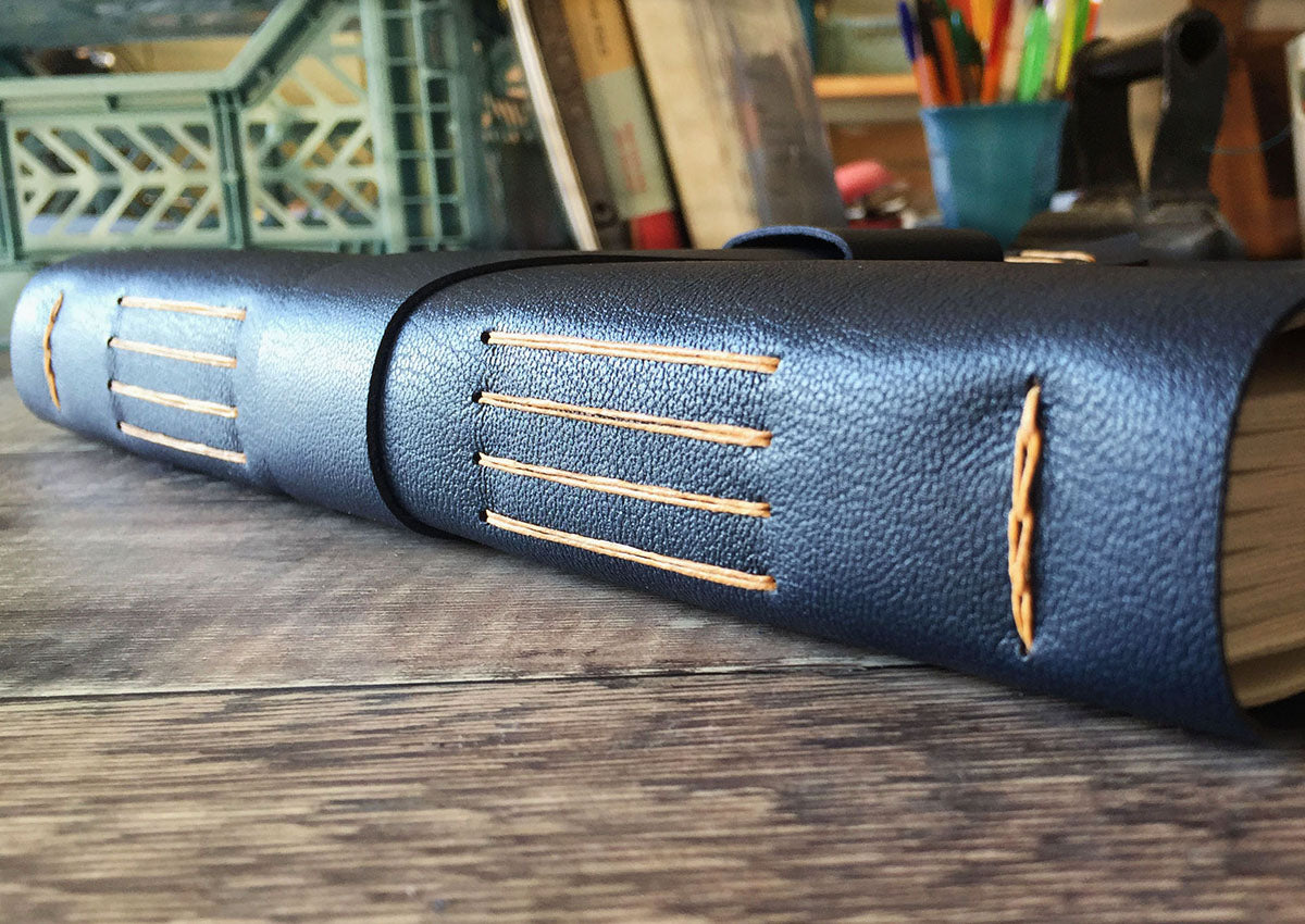 Longstitch with Linkstitch Navy Blue Leather Journal in the Bound by Hand studio, Dorset UK.