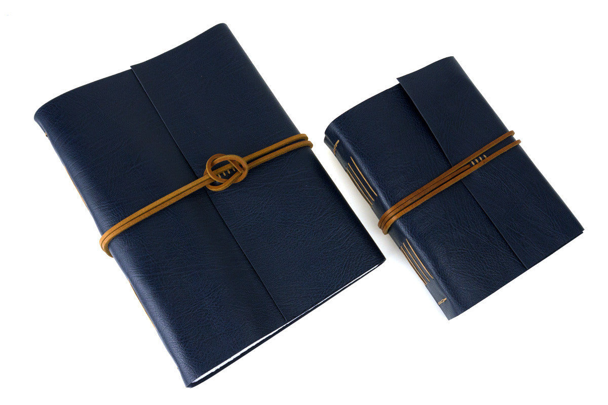 Leather Memory Books in A4 Large and A5 Medium portrait.