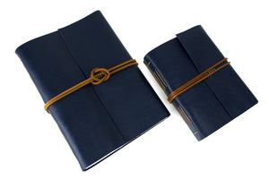 Leather Memory Books in A4 Large and A5 Medium portrait.