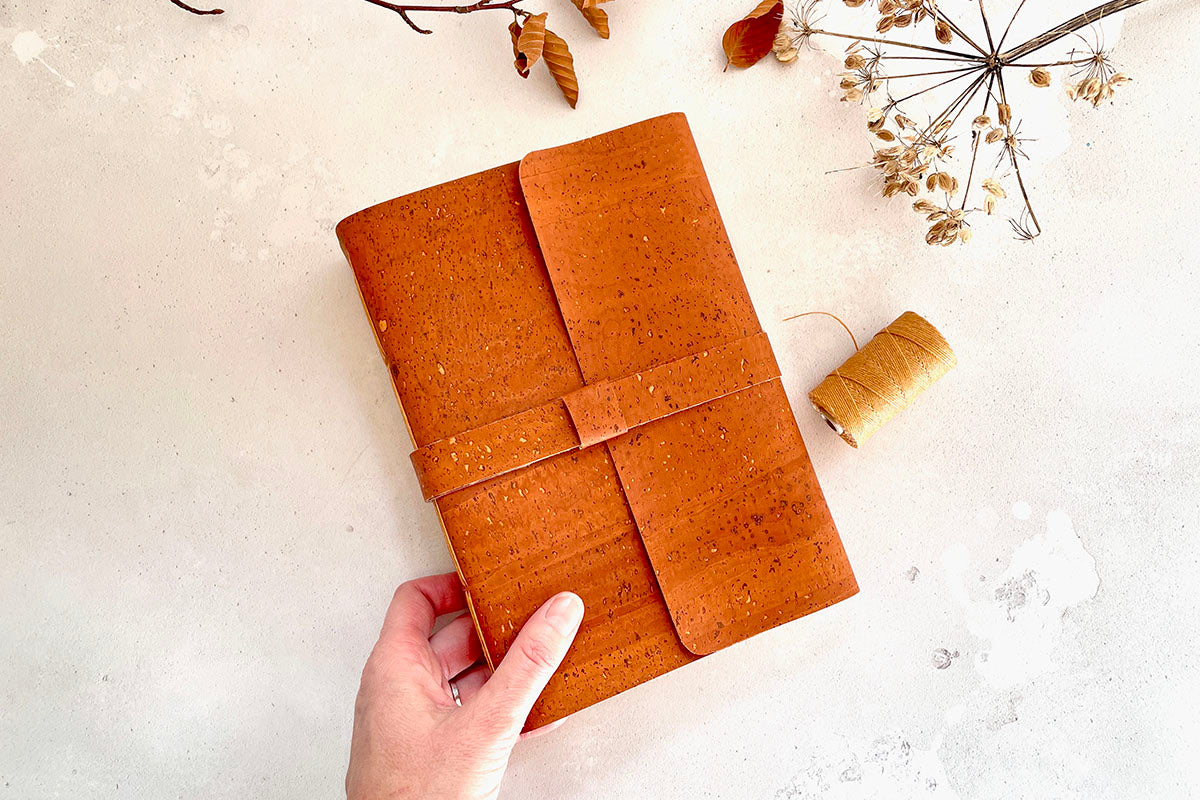 Handmade A5 Sketchbook bound in brown vegan cork textile and tan linen thread