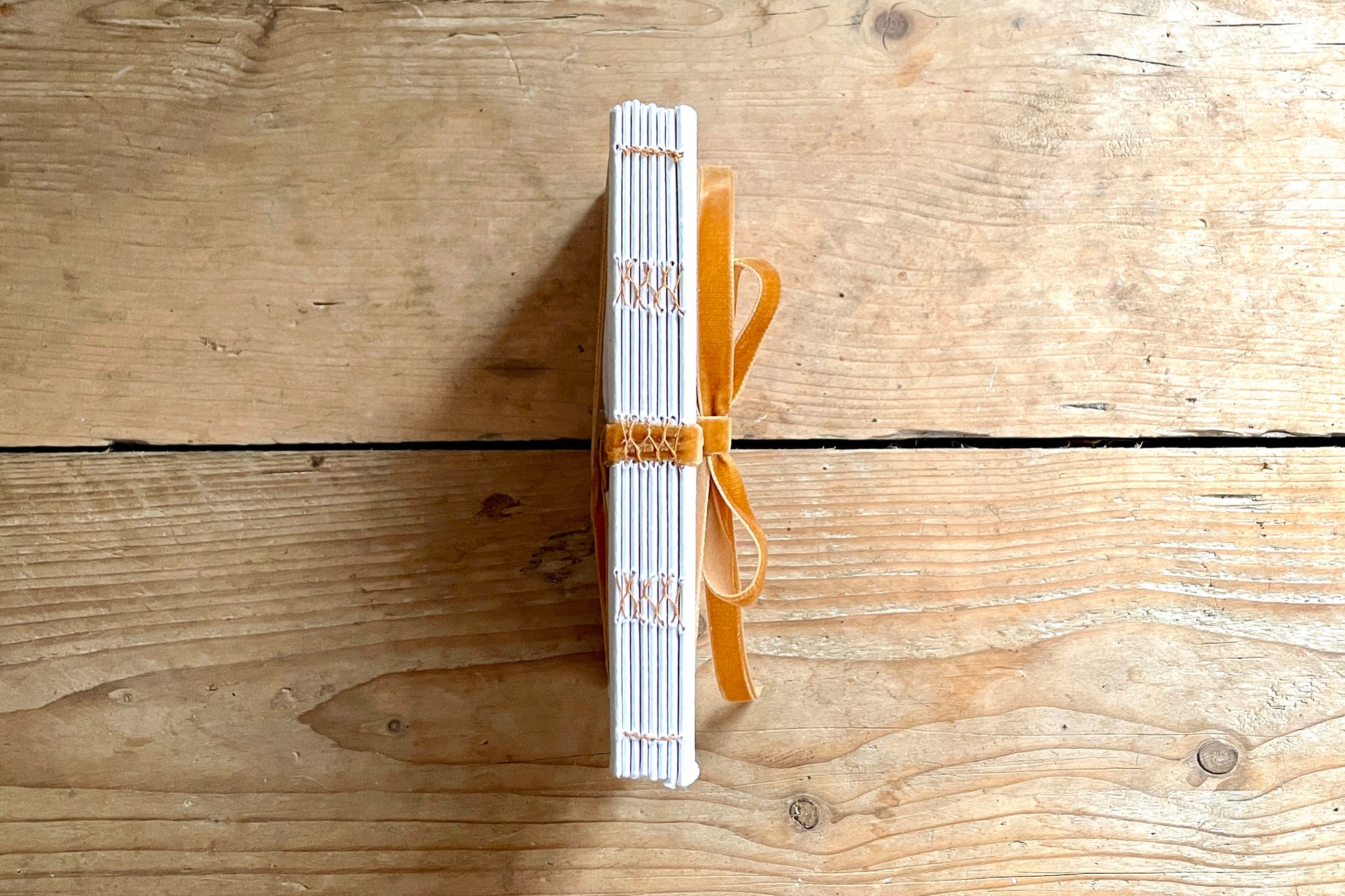 Fairtrade, handmade cotton rag sketchbook with tactile velvet ribbon