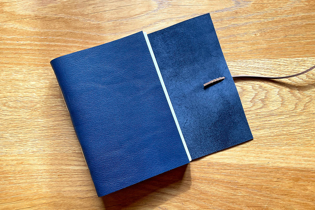 Navy Sketchbook retains the natural suede inner surface of leather for extra tactile pleasure.