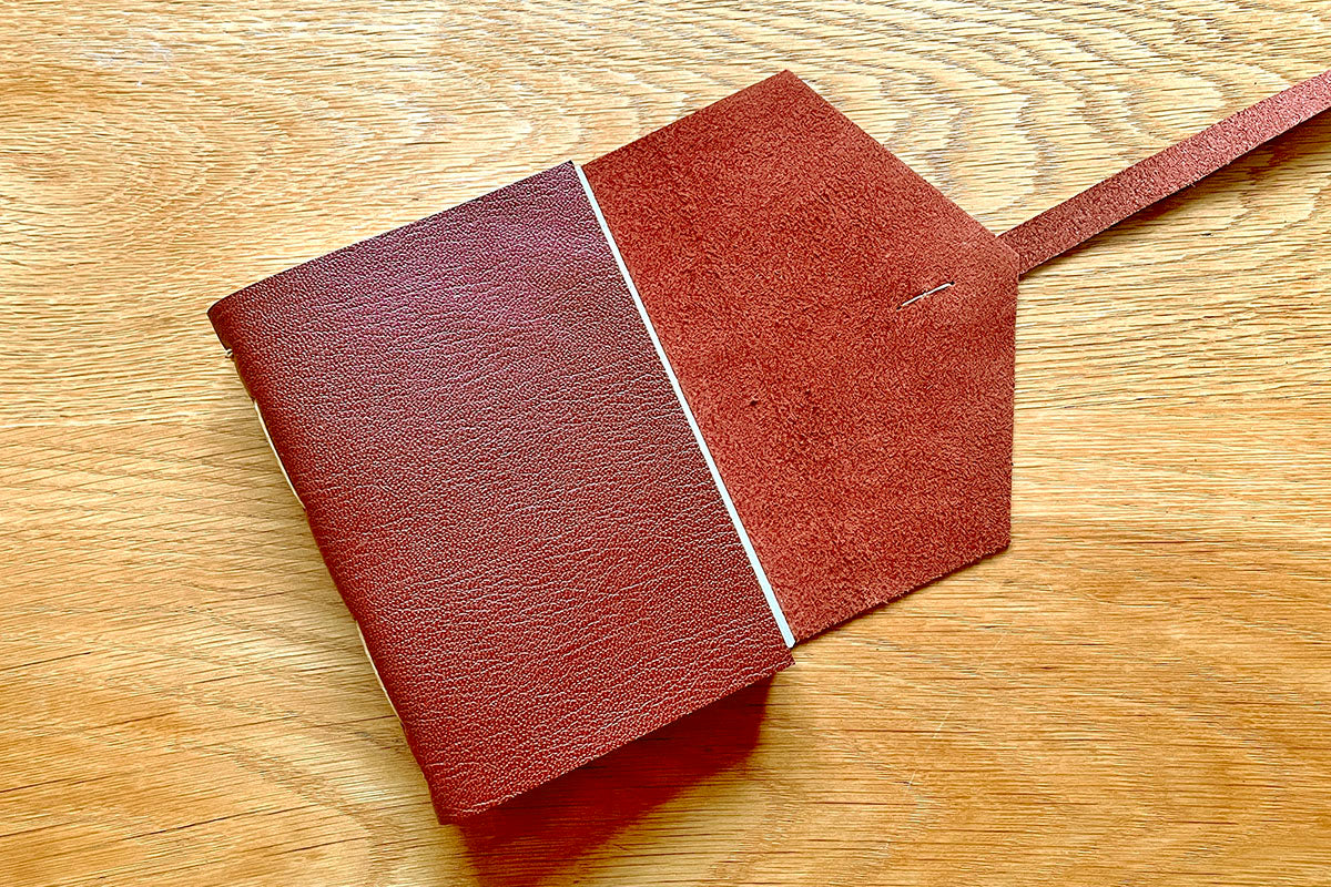 Oxblood leather journal with natural suede inner surface
