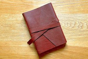Leather bound journal or notebook in autumnal Oxblood with Orange details