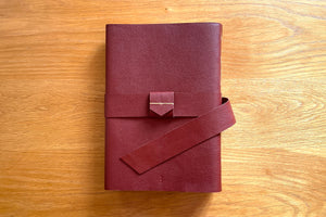 Buckle and BOUND logo debossed on Memory Book back cover