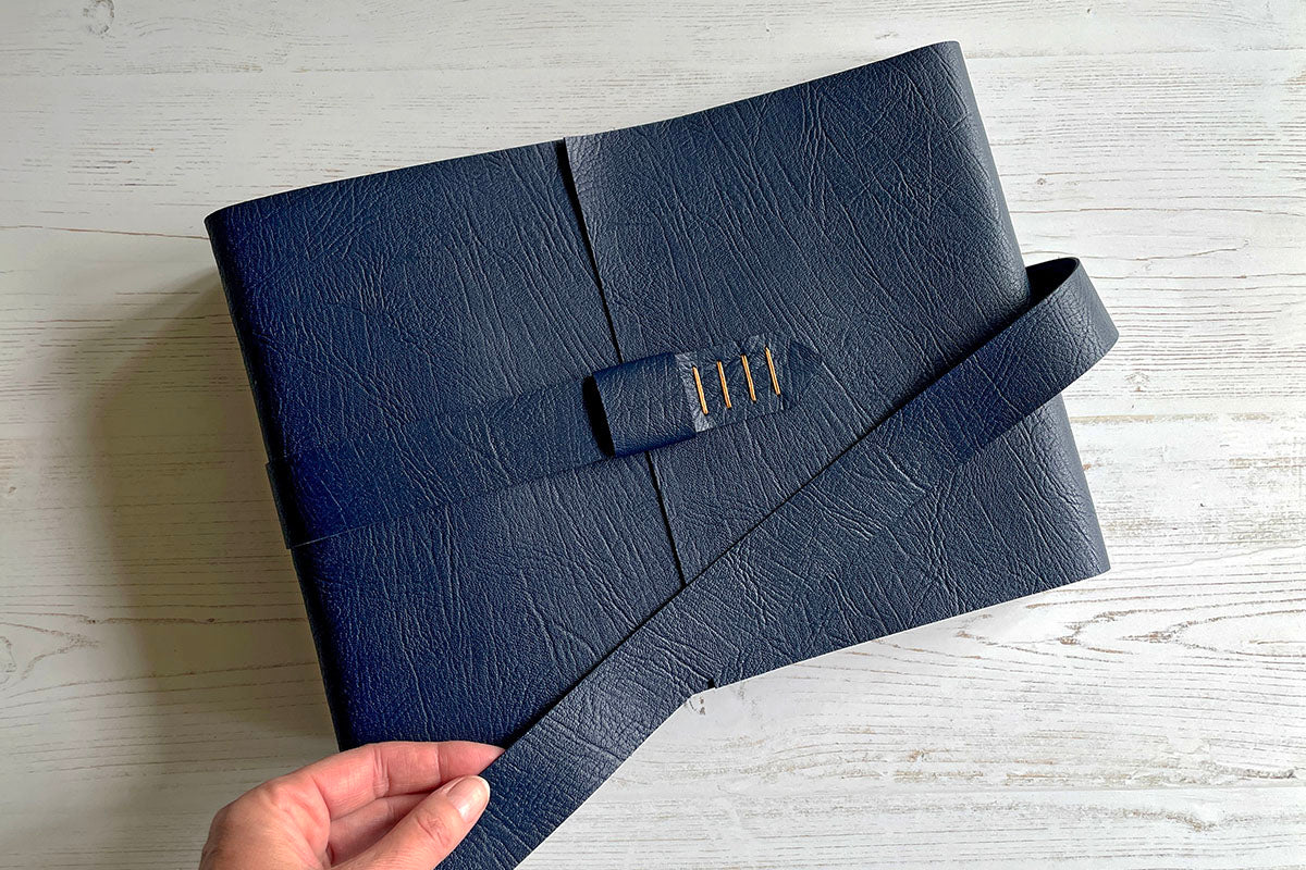 A4 Leather Memory Book / Scrapbook / Album: bound in Navy Blue in Longstitch with Linkstich binding