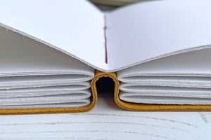 140gsm recycled cartridge paper pages lay flat and are stitched in Rust linen thread in this Leather bound Sketchbook.