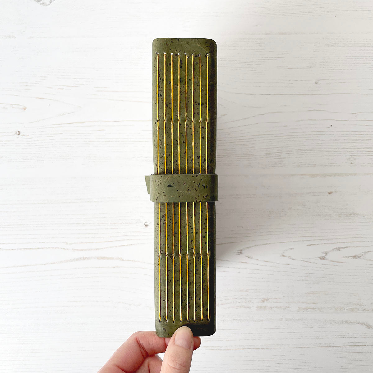 A5 Cork Vegan Sketchbook in Longstitch exposed spine binding in Yellow linen thread