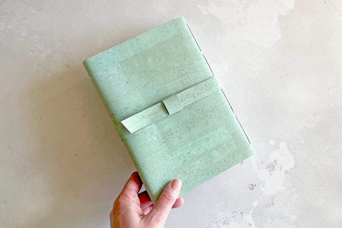Back cover of Vegan Sketchbook in Mint Green cork textile. 