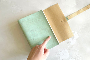 Slight crease on inside of front cover (seconds sale)