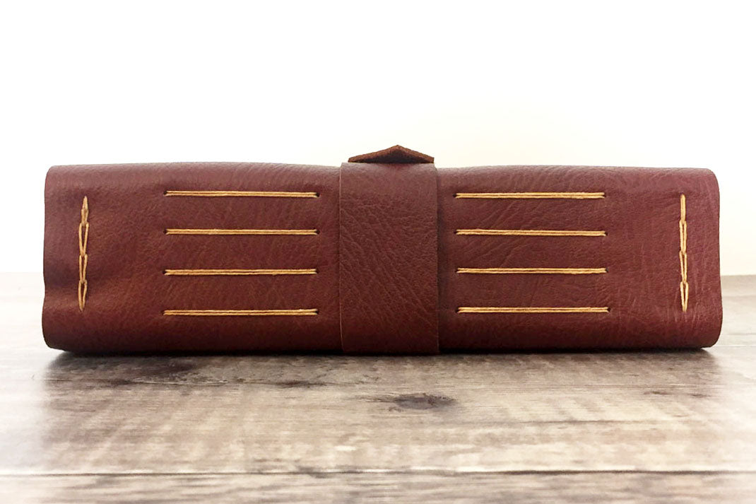 A4 large leather scrapbook bound by hand in Oxblood with Tan details