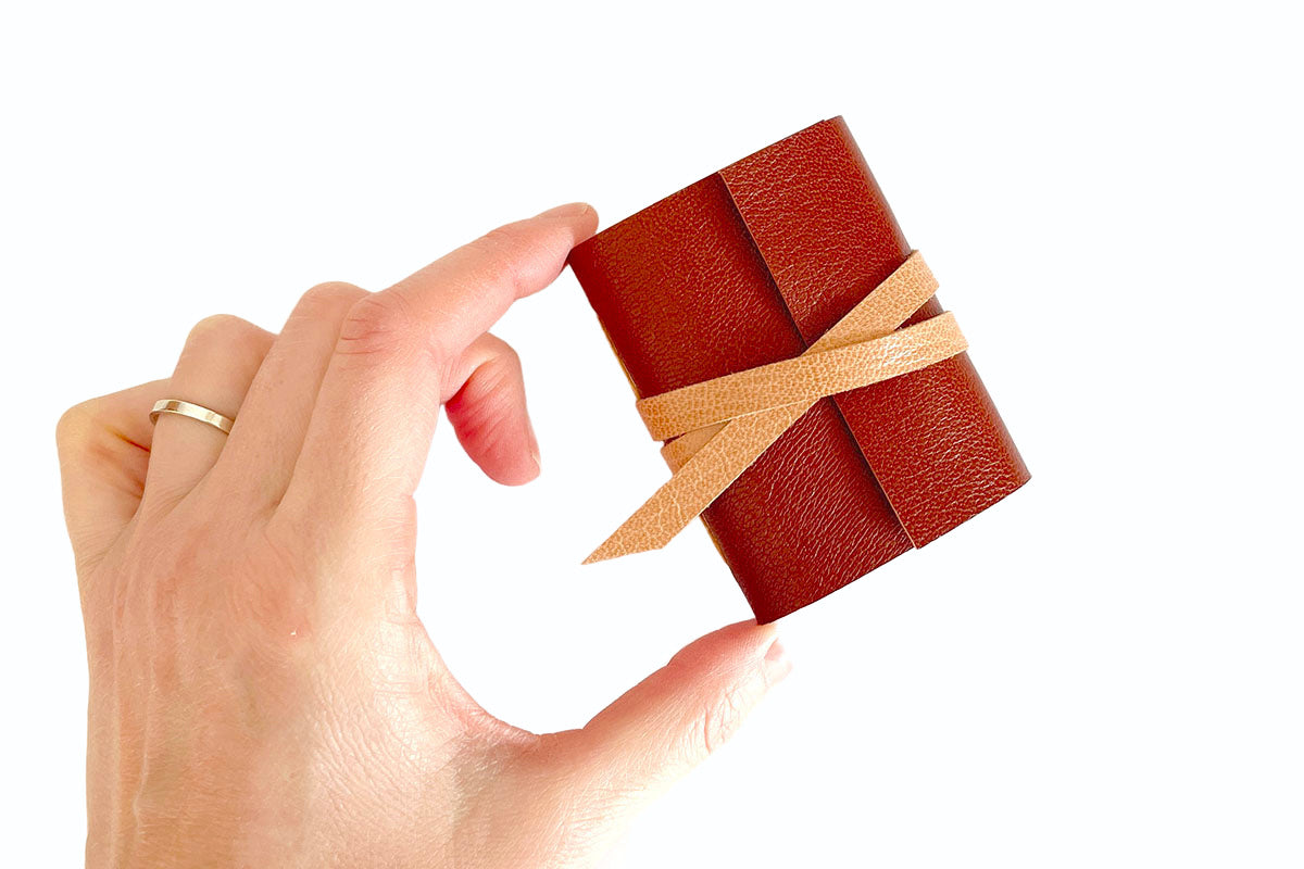 Miniature Leather Journal bound in Tan Brown, a quality handmade stationery gift.