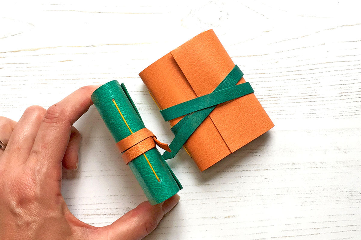 Miniature Leather Journals bound in Emerald Green and Peach, a desk accessory gift for stationery lovers