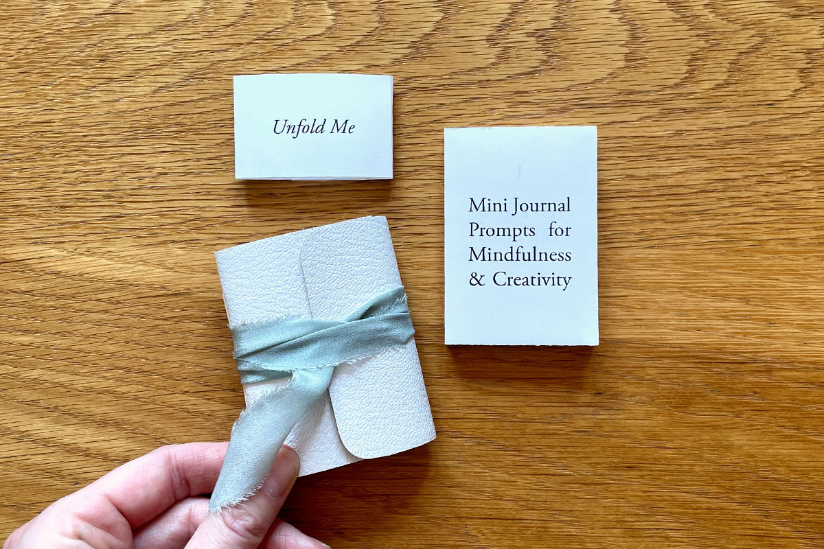 Miniature Journal bound in winter white leather paired with sea mist silk ribbon