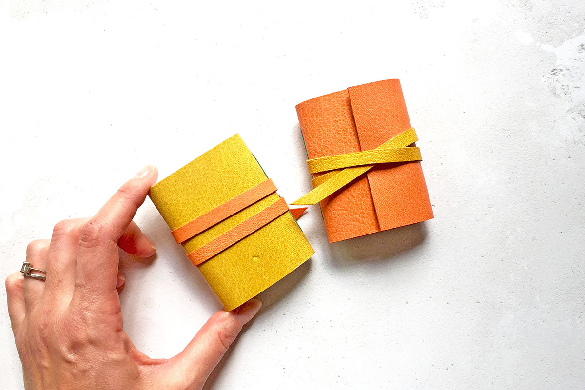 Mini notebooks bound in quality leather fit in a pocket ready for small sketches and nifty notes