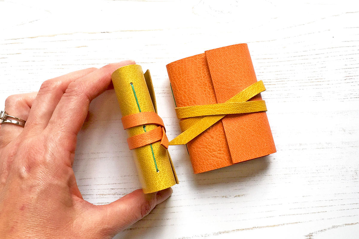 Mini notebooks bound in quality leather fit in a pocket ready for small sketches and nifty notes