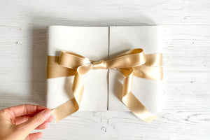 The Wedding Guest Book's 100% silk ribbon can be curled or ironed flat.