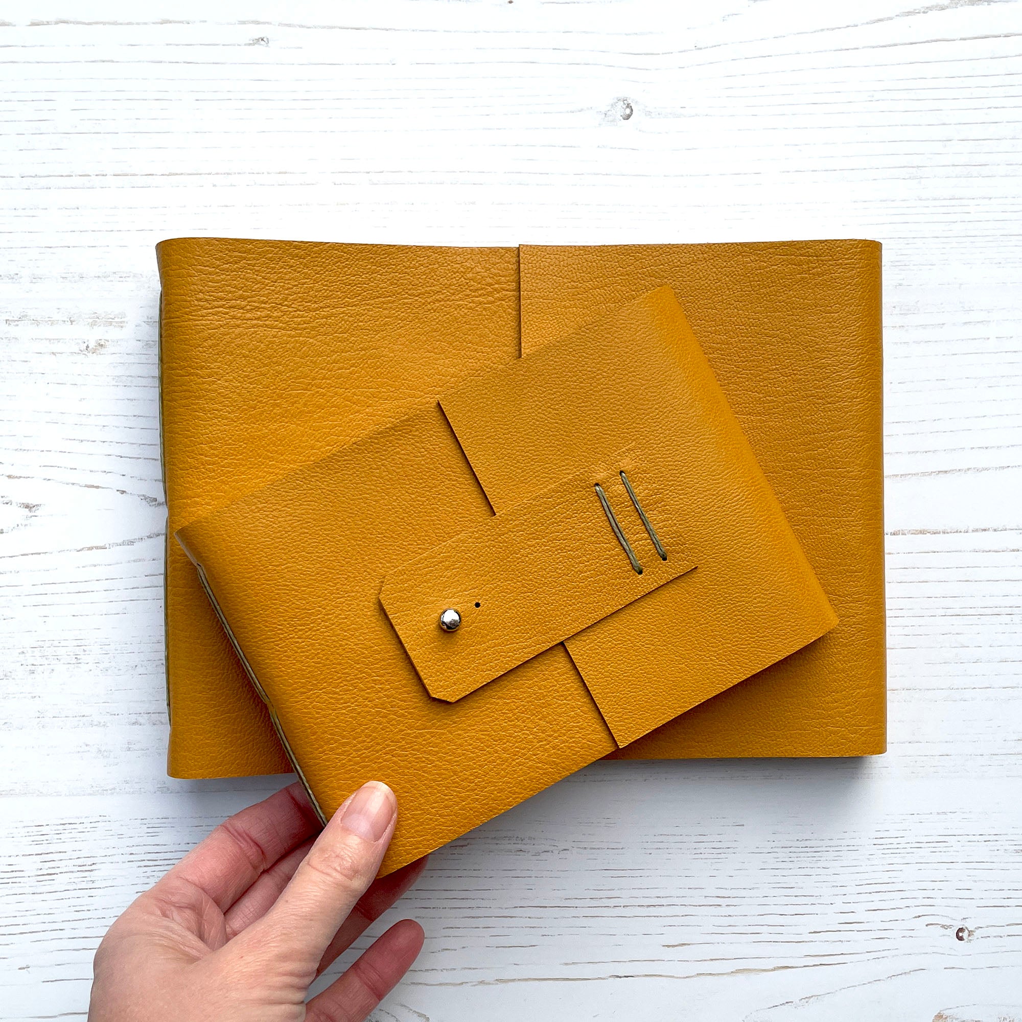 Watercolour Sketchbook bound in Mustard Yellow leather and Olive stitching, handmade in the UK