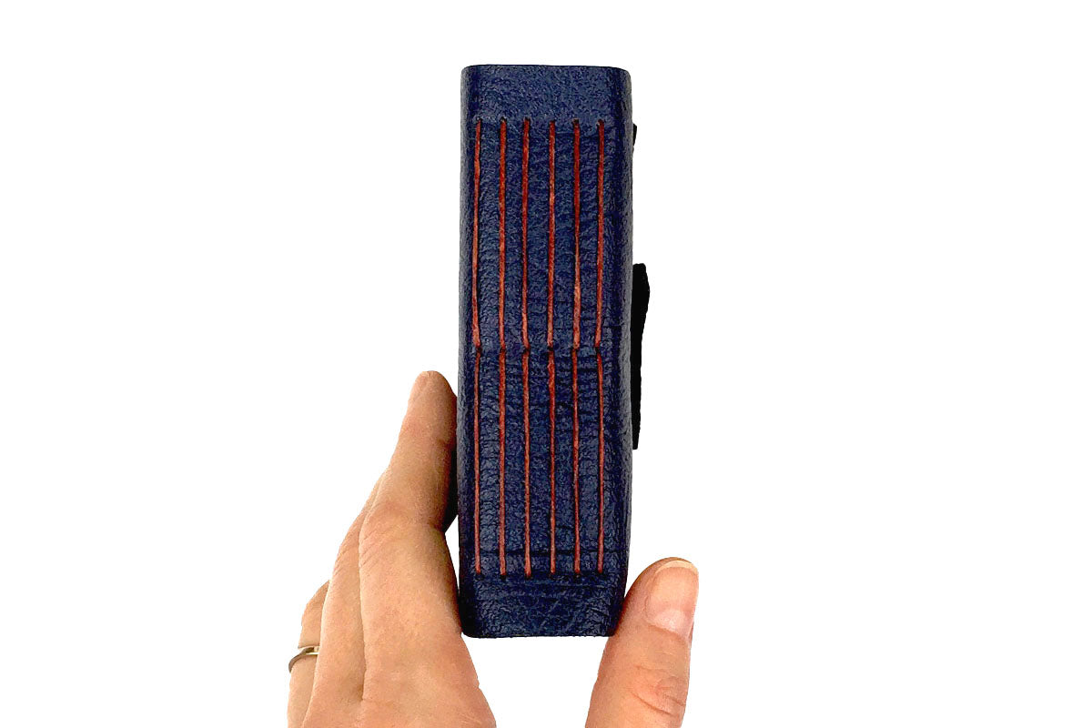 Leather Sketchbook bound in Navy Blue Leather with exposed spine lay flat binding in linen thread