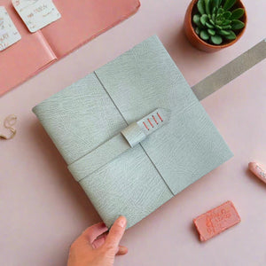 A5 Square leather memory book in pretty pastel feminine colours, a hand crafted engagement gift.