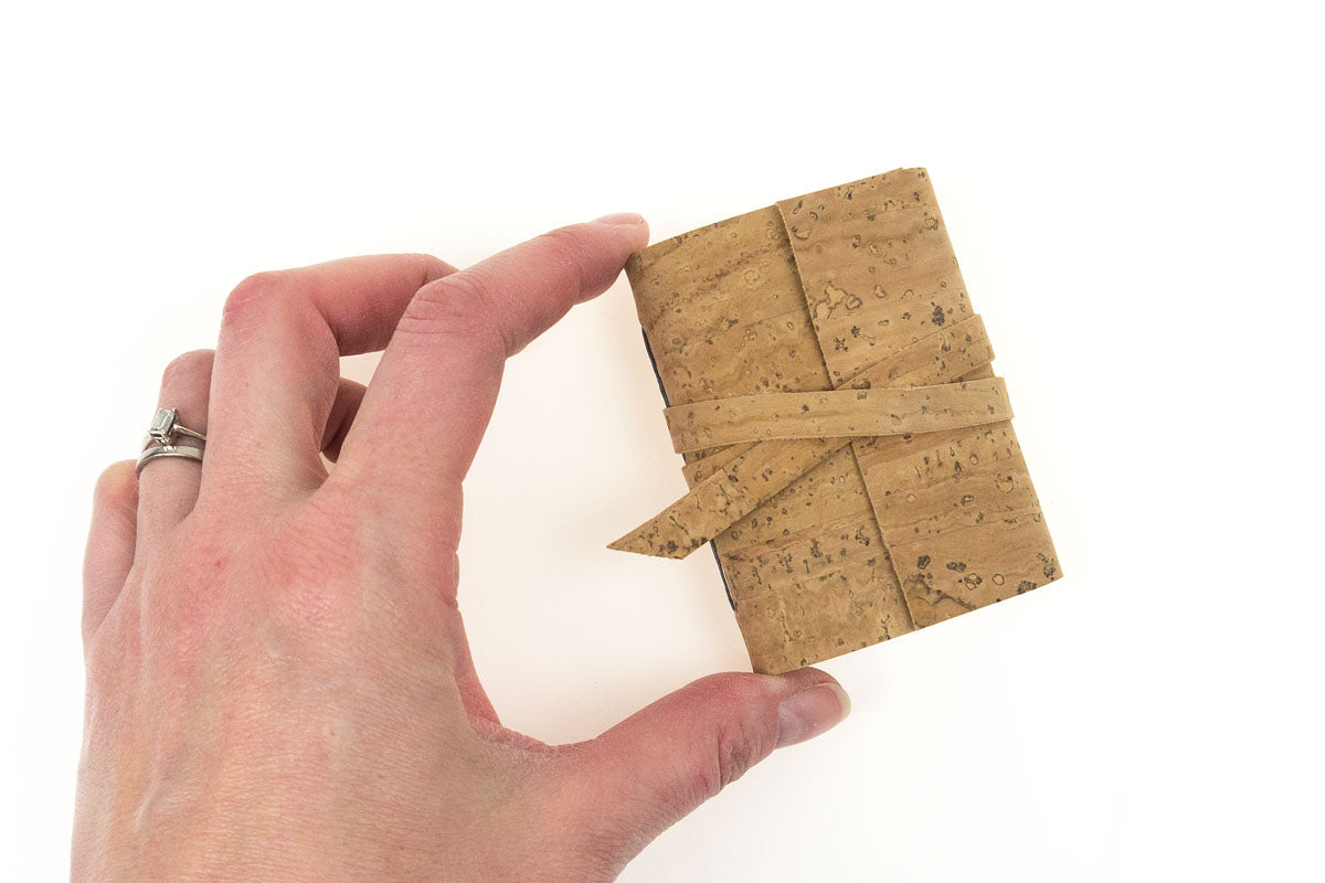 Miniature Notebook bound in Natural Vegan Cork is pocket sized and fits in the palm of the hand
