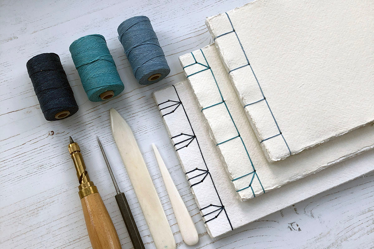 Japanese Stab Stitch Sketchbooks bound in cotton rag handmade khadi paper.