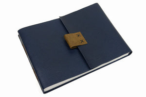A4 Large Leather Sketchbook bound by hand in Navy Blue with Brown details is a classic choice.
