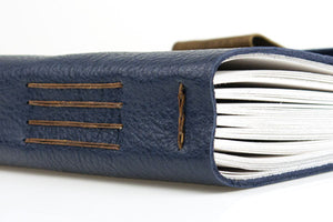 Detail of the accomplished binding style in this luxurious leather sketchbook