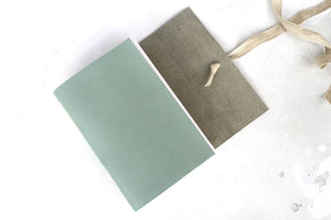 Softcover leather bound sketchbook handmade in the UK, Duck Egg and Linen, A6 size.