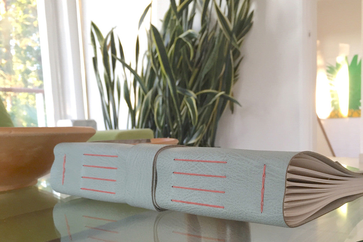 A leather Memory Book makes a wonderful third wedding anniversary gift