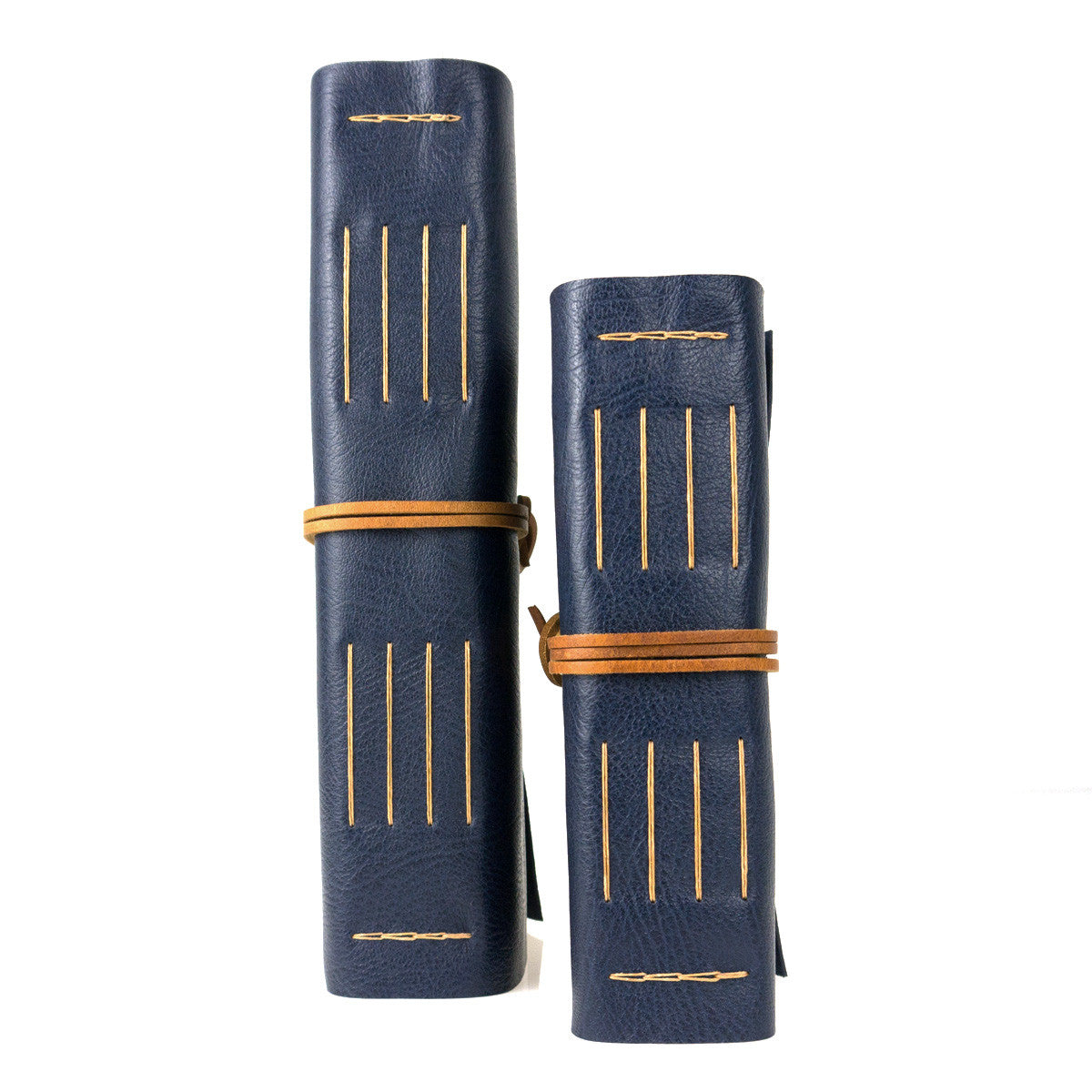 Leather Memory Book / Scrapbook bound by hand in Navy Blue and Tan. A4 portrait (left), A5 portrait (right).