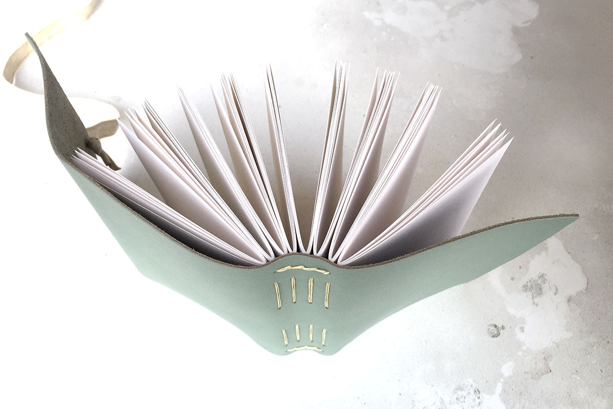 Leather sketchbook with Longstitch with Linkstitch exposed spine binding.