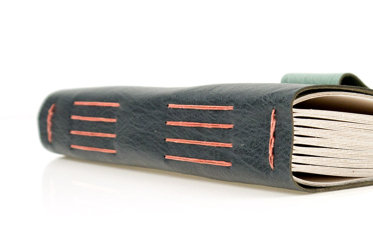 A4 Leather Sketchbook bound in Pewter Grey with a Duck Egg closing fob