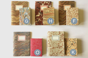 Variety of 'Small' Marbled Notebook Gift Sets: A6 and A7 paperback journals and slim jotters.