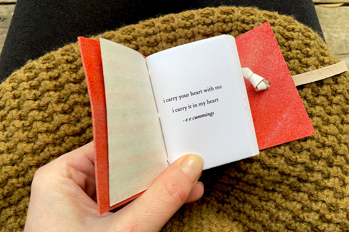 Romantic poem excerpt in handmade miniature book