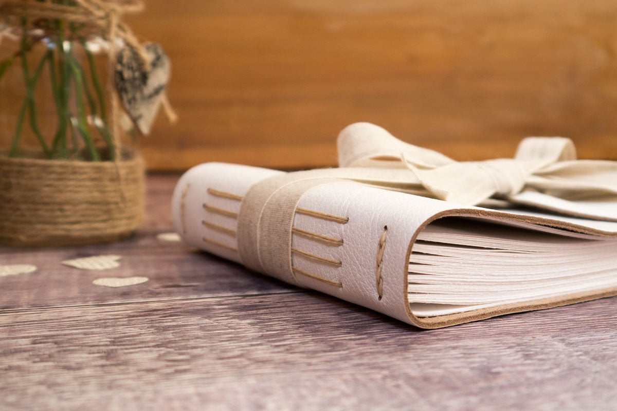 Wedding Guest Book handmade in sustainable natural materials for rustic, boho and eco-friendly weddings.